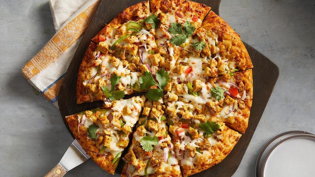 Curry Chicken Masala · Curry Sauce, Cheese, Bell Peppers, Diced Tomatoes, Red Onions, Masala Chicken and Fresh Cilantro..