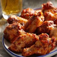 Tandoori Wings · Traditional bone-in wings seasoned with spicy house blend of tandoori spices. Each 5pc order...