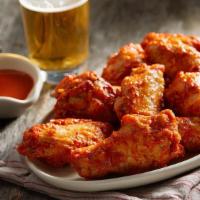 Hot Wings · Traditional bone-in wings topped with spicy buffalo hot sauce. Each 5pc wings comes with a s...