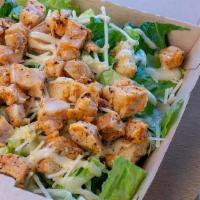 Spicy Chicken Caesar Salad · Lettuce, seasoned croutons, Parmesan cheese and caesar dressing and spicy chicken