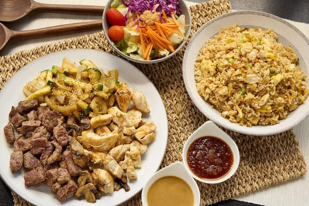 Steak* & Chicken · Hibachi steak* and chicken breast grilled to your specification.  Available for 2, 4 or 6! . Served with: . - House salad. - Hibachi vegetables . - Homemade dipping sauces. - Chicken Fried Rice