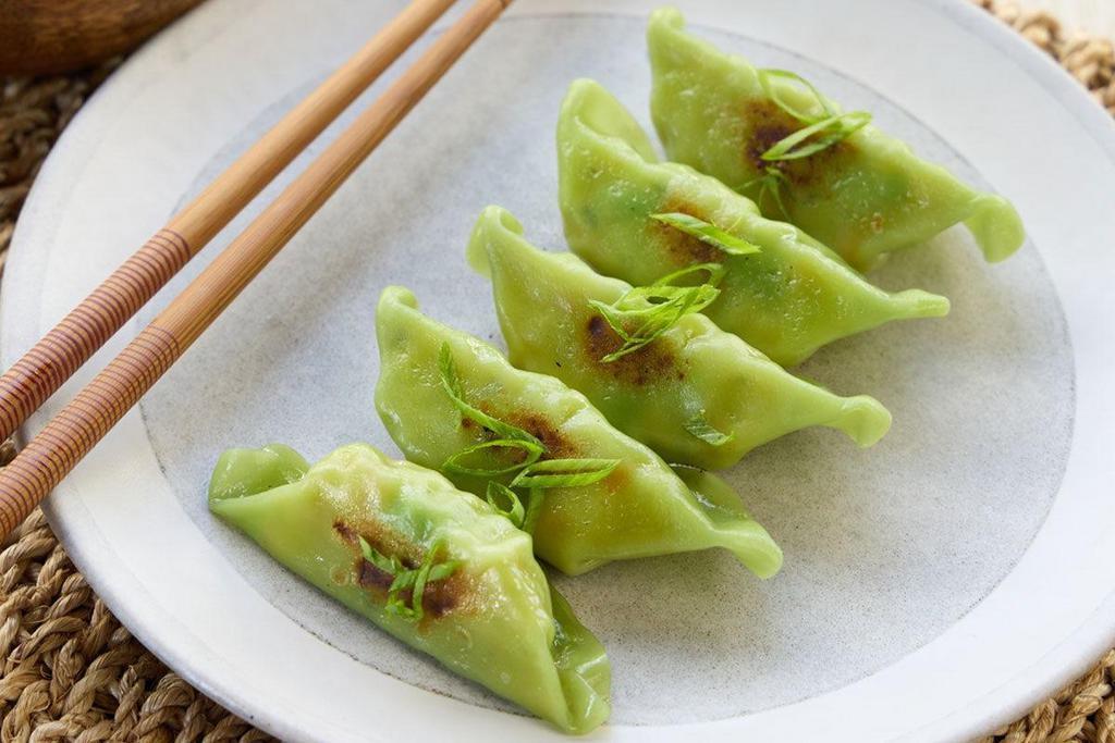 Edamame & Vegetable Gyoza · Spicy sesame soy dipping sauce.