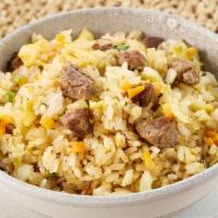 Steak Fried Rice · Grilled steak, rice, egg and chopped vegetables.