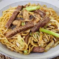 Steak Yakisoba Bowl · Japanese sautéed noodles with steak and mixed vegetables in a special sauce and sprinkled wi...