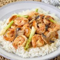Shrimp Teriyaki Bowl · Grilled shrimp served over rice with scallions and topped with sesame seeds. Served with Ter...