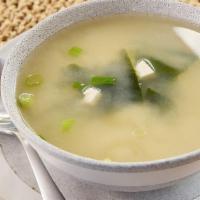 Miso Soup · A delicious blend of miso, greens onion and tofu.