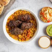 Beef  Kebab Rice Bowl · Turmeric spiced Basmati rice simmered with tomatoes, garlic, onions, mint and parsley. Toppe...