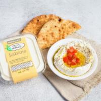Labane | 8oz (Dips & Sauces) · Strained yogurt cheese topped with za'atar, tomatoes, and olive oil (gf)