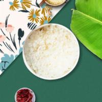 Steamed Rice · Freshly steamed white rice.