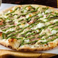 Classic Pesto Chicken Pizza · Pesto classic pizza made with pesto sauce as the base topped in with onions, olives, diced s...