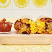 Steak Breakfast Burrito · Two scrambled eggs, tater tots, grilled steak, and melted cheese wrapped in a fresh flour to...