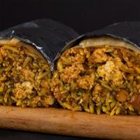 Punjabi By Nature Burrito · Saag paneer, tikka masala with choice of protein, rice, chana garbanzo masala, and sliced on...