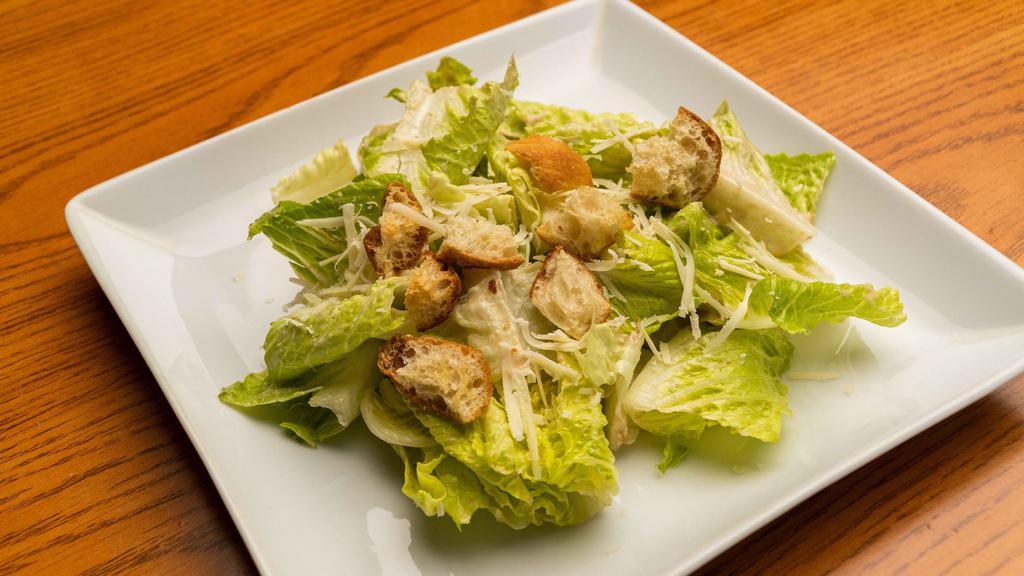 Ceaser salad · Romain lettuce with homemade Caesar dressing, parmesan cheese and croutons