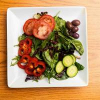 House salad · Organic mixed  greens with tomatoes, cucumber, olives, and peppers in balsamic Italian dress...