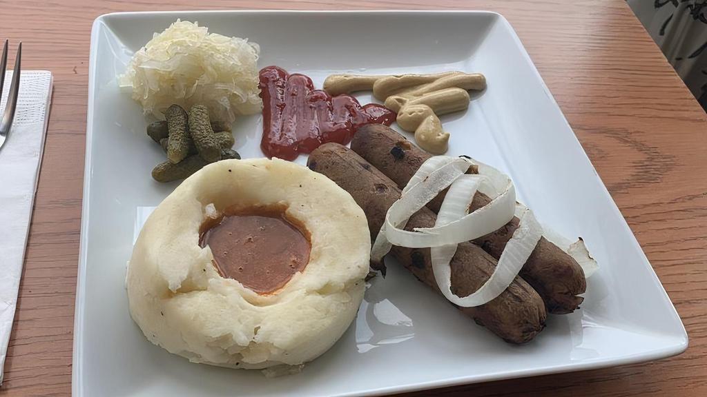 Vegan Sausage · Served with Sauerkraut, Pickles and local Bread