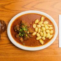 Paprika goulash · Traditional slow cooked  pork stew with organic broth, paprika and other spices.Served with ...