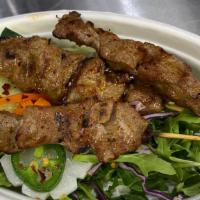 3 Beef Skewers · Tri-tip marinated with Cambodian BBQ sauce, char-broiled. Contains fish and shellfish.