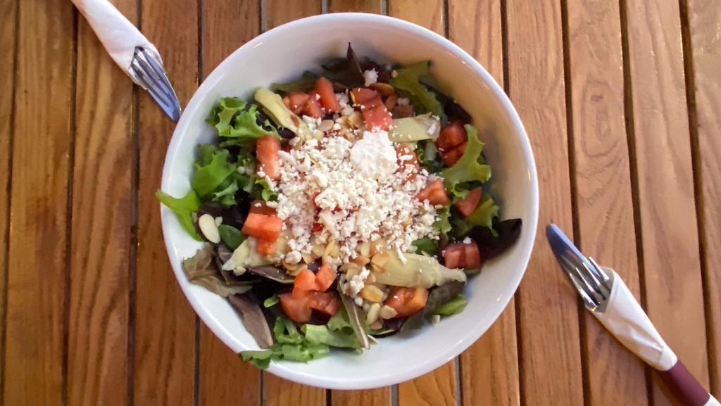 Winter Salad · Pearl couscous,spring mix,marinated artichoke hearts,Spanish piquillo peppers,toasted almonds, tomato,feta cheese, olive oil and lemon dressing.