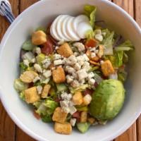 Cobber · House romaine mix,hard-boiled egg, avocado, tomatoes, cucumber,onions, garlic croutons, gorg...