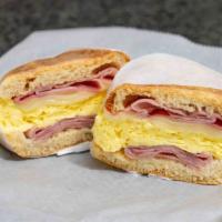 English Muffin Sandwich · Your choice of bacon, ham or sausage, egg, and cheese.