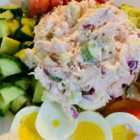 Chicken Salad Salad · Chicken salad mixed with chopped celery & onion on top of romaine lettuce, tomato, cucumber ...