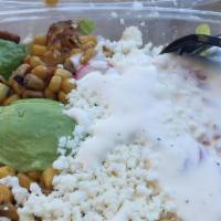 Tossed Mexicali Salad · Romaine, veg black beans, queso fresco, avocado, pico de gallo, corn, radish, broken corn ch...