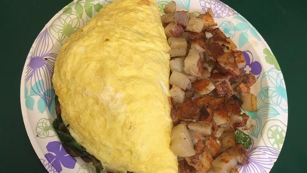 7D. Three Egg Omelet with Toast or Potatoes (Veggie Cheese Omelet) · Served with Grilled Onion, Bell Pepper, Mushrooms, Spinach, Avocado & Cheese