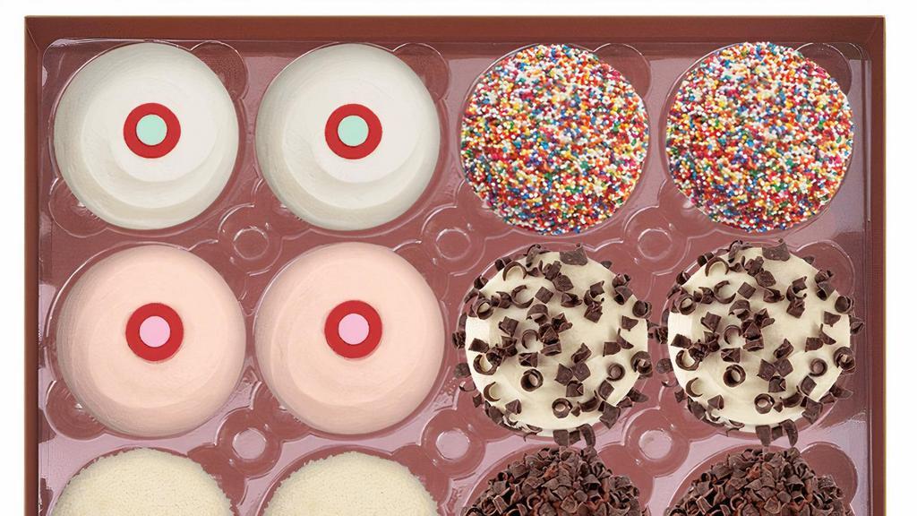 Assorted Dozen Box · variety box features our best selling cupcake flavors. 2 red velvet, 2 black & white, 2 strawberry. 2 vanilla, 2 sprinkle, 2 dark chocolate. ***Max quantity per order is 2 dozen
