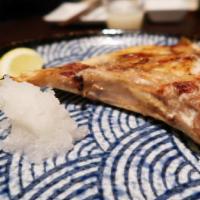 Hamachi Kama · grilled yellowtail fish collar  come with squeezed lemon, daily fresh grated  daikon & ginge...