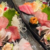 Omakase Sashimi 12 pcs · 12 pieces different kinds of daily seasonal fish. Included Japanese fish, come with miso sou...