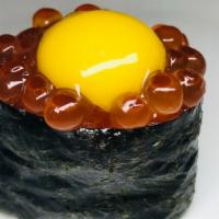 Ikura with Quail Egg · Salt cured salmon roe and quail egg yolk