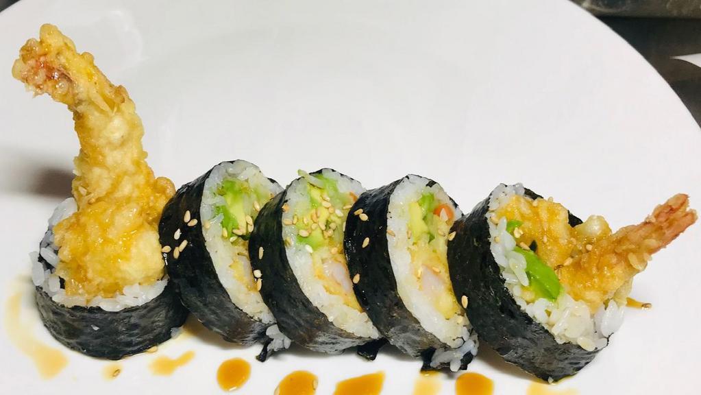 Shrimp Tempura Roll · Shrimp tempura, avocado, cucumber and pickled burdock root, topped with sweet sauce and sesame.