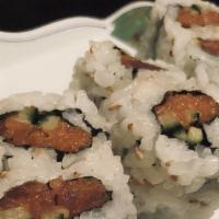 Spicy Tuna Roll · Diced spicy tuna and cucumber wrapped with rice and nori top with sesame.