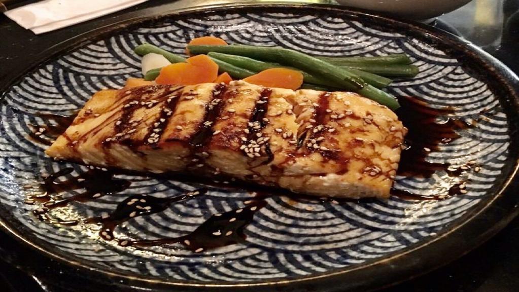 Salmon Teriyaki · Grilled salmon steak come with miso soup, steamed rice, broccoli & carrot , teriyaki sauce.