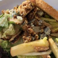 Chicken Apple Salad · Chicken, baby mixed greens, shaved fennel, Fuji apples, crumbled Blue Cheese, and candied wa...