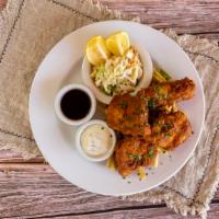 Fish & Chips · Beer battered Cod, served with fries and coleslaw
