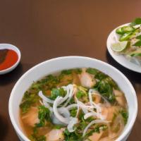 Pho Ga Dac Biet An Nam · Combination chicken rice noodle soup.