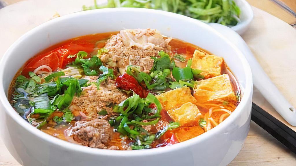 Bun Rieu · Tomato and crab base vermicelli noodle soup.
