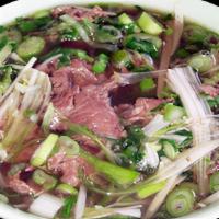 Pho Bo Dac Biet · Filet mignon, flank, brisket, soft tendon, tripe, and meatballs rice noodle soup.
