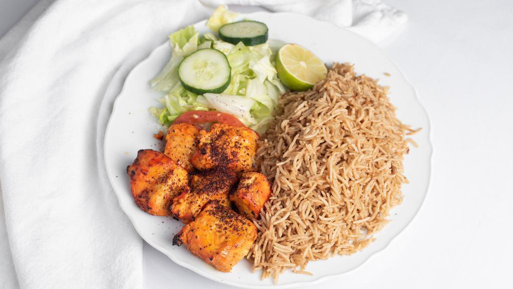 Chicken Kabob	 · Charbroiled skewer of delicious marinated chicken breast, tomato, served with basmati rice.