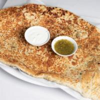 Bolani · Afghan calzone, lled with chopped leeks and/or potatoes, seasoned with cilantro and other sp...