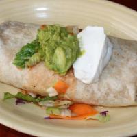 Burrito “El Grande” · Flour tortilla stuffed with your choice of meat, rice, & beans. With sour cream & guacamole ...