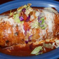 Burrito “El Famoso” · Stuffed with rice, beans, enchilada sauce and cheese topping.