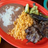 Carne Asada · Tender juicy steak, grilled to your taste. Includes salad, grilled onions and guacamole.
Ser...