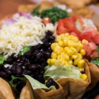 El Patio’s Salad Bowl · Flour tortilla shell filled with refried beans, rice,
salad mix, red onions, tomatoes, corn,...