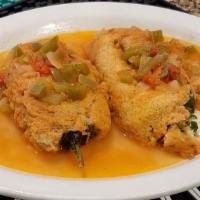 Chile Relleno · Mild green Chile stuffed with melted monterey jack cheese, dipped in egg batter, fried ‘till...