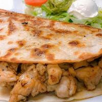 Quesadilla · Flour tortilla with Monterrey and Jack cheese on the side pico de gallo cheese, and sour cre...
