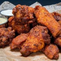 Wings - 10 Piece · 10 Crispy Big-Ass Bone-In wings with flavor choice

Flavor served on the side (except Nashvi...