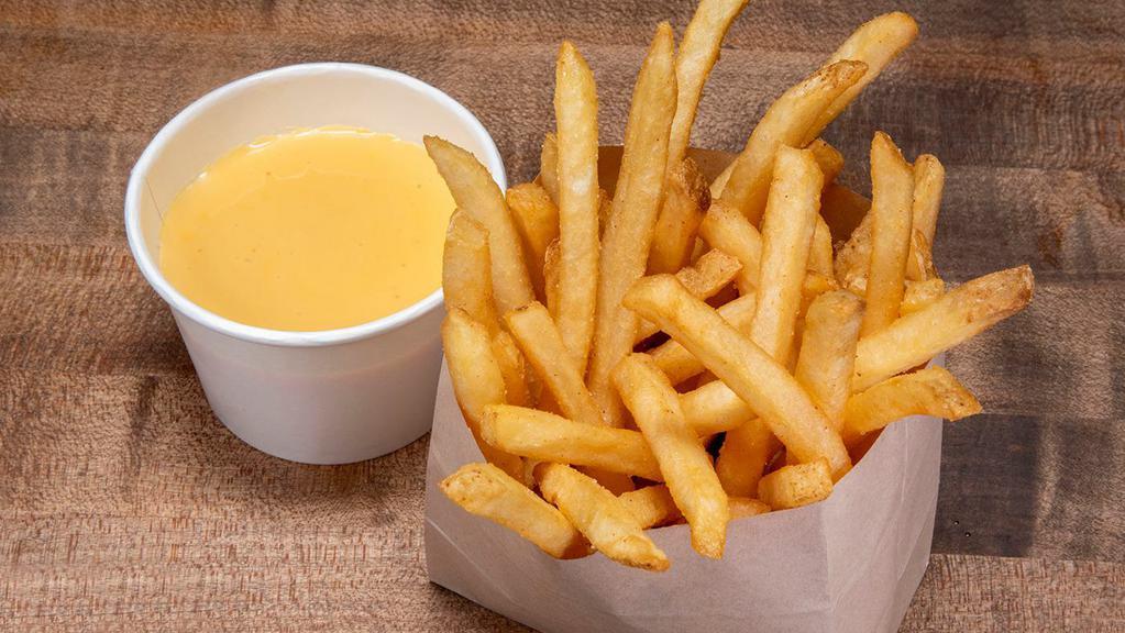 Cheese Fries · Crispy fries with cheese sauce