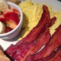 Bacon  · 4 strips of bacon served with 2 eggs with your choice of side and toast or available substit...